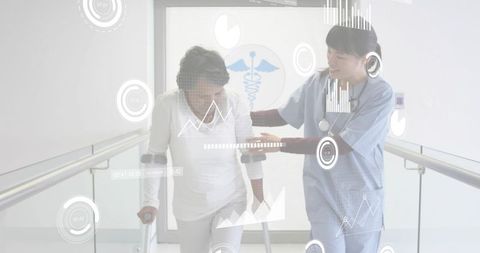 Nurse guiding patient using forearm crutches during rehab with hud mobility graphics