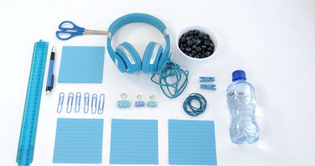 Organized Desktop Supplies in Blue with Healthy Snack - Download Free Stock Images Pikwizard.com