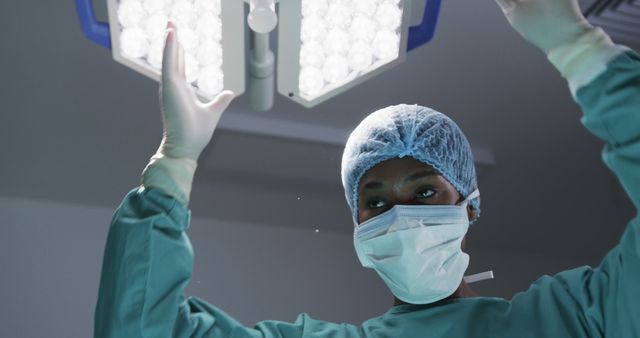 Surgeon Wearing Surgical Gloves During Operation in Operating Room - Download Free Stock Images Pikwizard.com