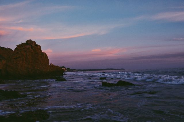 Rocky Coastal Sunset with Waves Crashing - Download Free Stock Photos Pikwizard.com