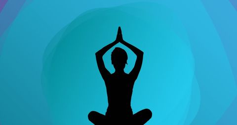 Silhouette of Woman Meditating against Blue Background - Download Free Stock Images Pikwizard.com