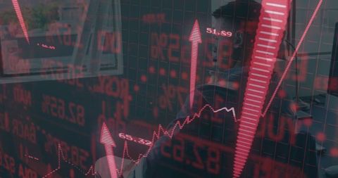 Financial analyst examining live stock data on office equipment