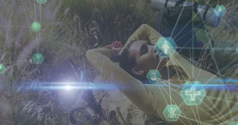 Hiker Relaxing in Nature with Futuristic Overlays