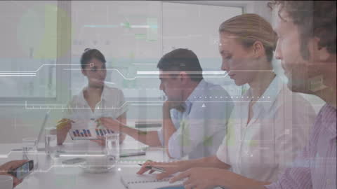 Business Team Analyzing Data with Technology Overlay in Office