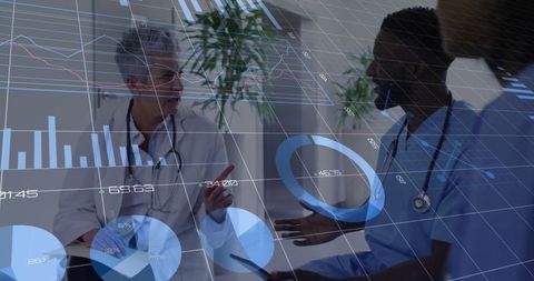 Medical Professionals Analyzing Graphs and Data in Healthcare Environment