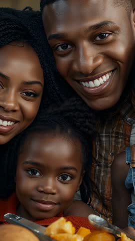 Warm family smiling together in vertical video close-up sharing joyful moment