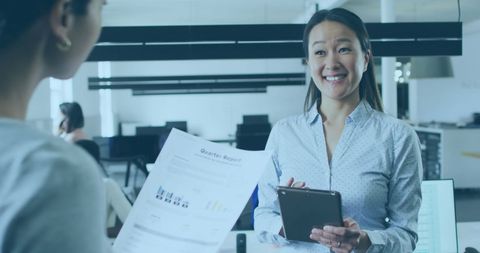 Positive Business Meeting with Asian Female Team Leader