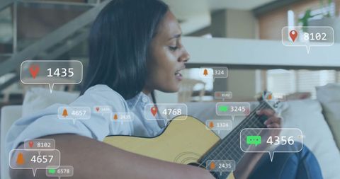 Guitarist Engaged in Social Media Overlays Concept