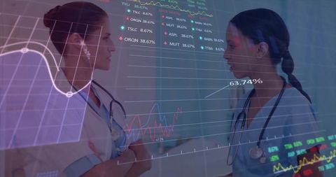 Diverse Female Doctors Analyzing Medical Data in Hospital