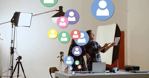 Creative professionals collaborating in modern studio setting