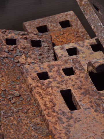 Close-up of weathered rusted metal objects