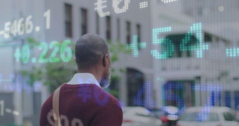 Businessman Analyzing Interactive Stock Market Projections