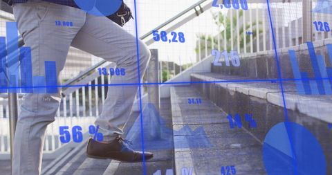 Businessman climbing stairs with data overlay for financial growth concept