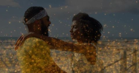 Couple Embracing and Gazing on Pier with Golden Bokeh Glow for Romantic Moments