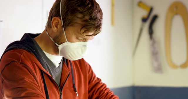 Carpenter Wearing Face Mask Working Indoors - Download Free Stock Images Pikwizard.com