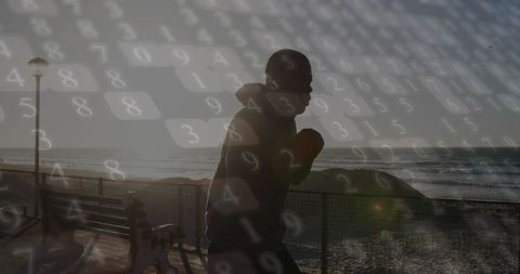 Sunrise boardwalk shadowboxing with digital data overlay, urban fitness motivation