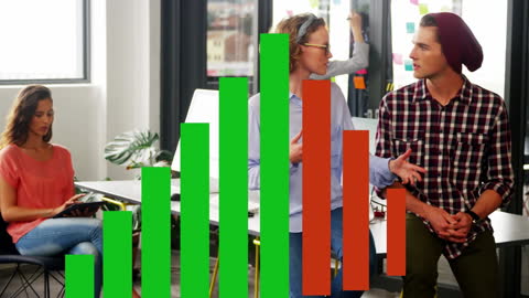 Diverse Coworkers Discussing Financial Growth in Modern Office