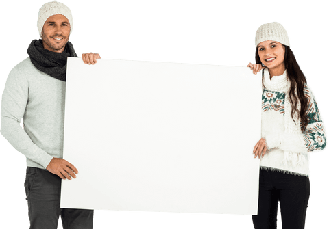 Cheerful Couple Displaying Large Transparent Blank Placard in Winter Apparel