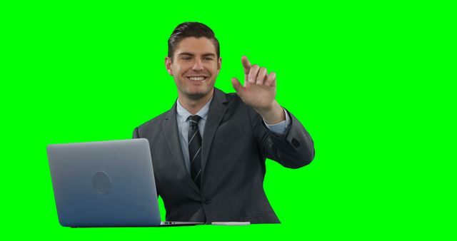 Businessman Smiling and Interacting with Virtual Interface on Green Screen - Download Free Stock Images Pikwizard.com