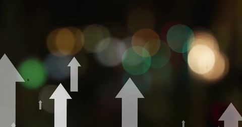 Abstract growth arrows over blurred night city