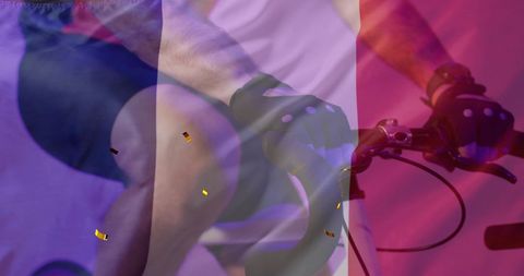 Cyclist Celebrating France Overlaid with Flag and Confetti