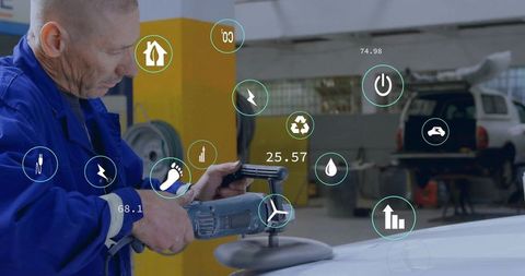 Auto Mechanic Polishing Car Roof with Digital Innovation Symbols