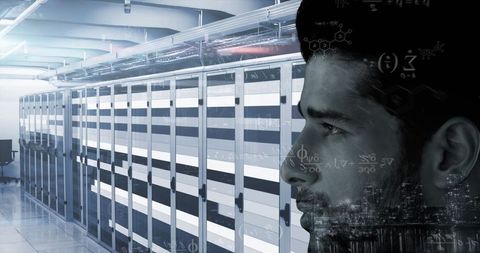 IT Engineer Overseeing Data Center with Futuristic Digital Graphics