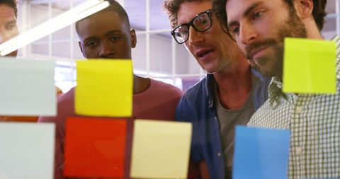 Team Collaborating with Colorful Sticky Notes in Office - Download Free Stock Images Pikwizard.com