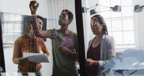 Collaborative team discussing data analysis on virtual screen