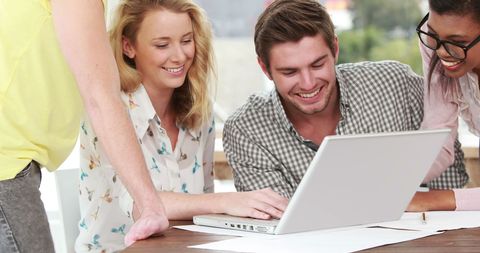 Young Professionals Engaging in Collaborative Meeting with Laptop - Download Free Stock Images Pikwizard.com