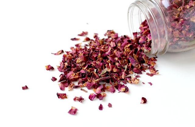 Dried Rose Petals Spilling from Jar on White Background - Download Free Stock Photos Pikwizard.com