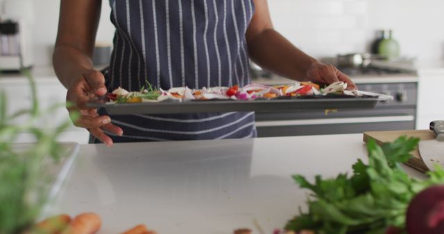 Close-Up of Person Preparing Fresh Vegetables in Modern Kitchen - Download Free Stock Images Pikwizard.com