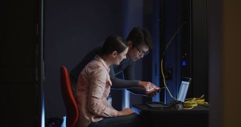 Professionals Analyzing Data in Server Room Environment - Download Free Stock Images Pikwizard.com