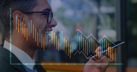 Young professional speaking into smartphone with floating financial charts, data overlay