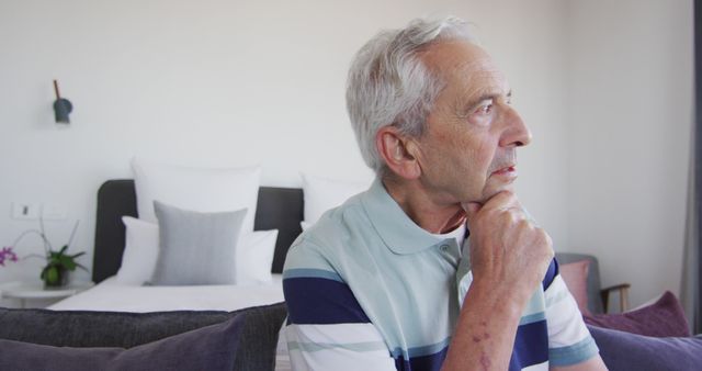 Elderly Man Reflecting at Home - Download Free Stock Images Pikwizard.com