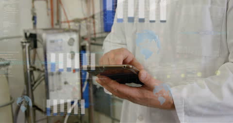 Engineer Analyzing Data Using Digital Tablet in Factory
