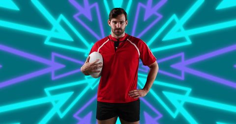 Confident American Football Player Holding Ball