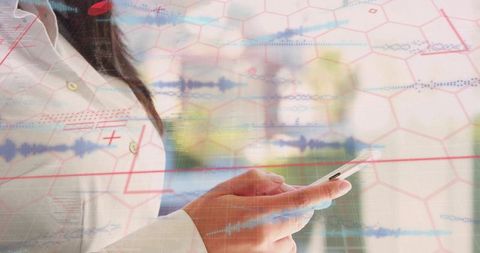 Doctor holding smartphone viewing medical data overlays telemedicine health analytics