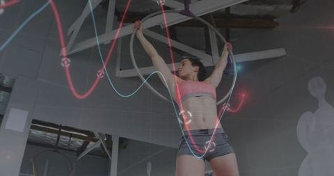 Athlete Performing Aerial Hoop Routine with Dynamic Lei Crossfit Overlay