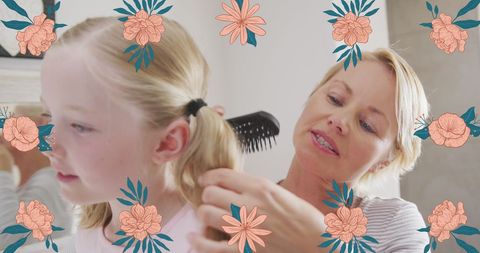 Mother Gently Combing Daughter's Hair with Florals