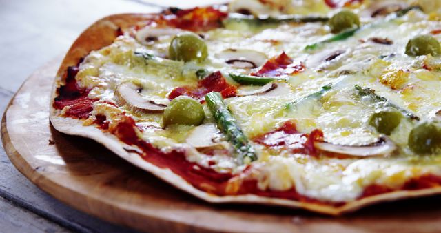 Close-up of Fresh Vegetarian Pizza Slices on Wooden Board - Download Free Stock Images Pikwizard.com
