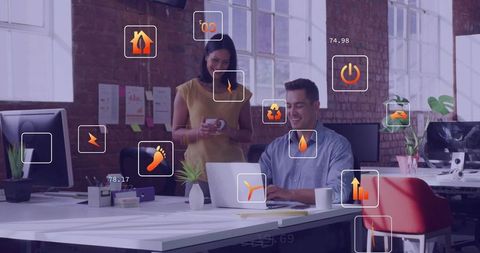 Colleagues collaborating in modern loft office monitoring augmented energy analytics hud