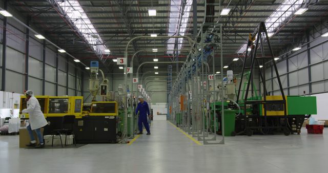 Manufacturing Factory Workers Operating Industrial Machinery - Download Free Stock Images Pikwizard.com