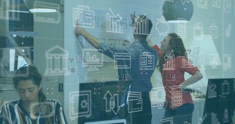 Team Analyzing Architecture Plans with Tech Overlay