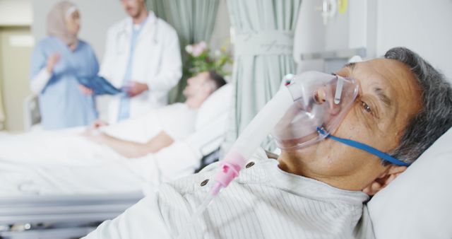 Elderly Man with Oxygen Mask in Hospital Bed - Download Free Stock Images Pikwizard.com