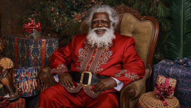Festive celebration with santa in embroidered red suit