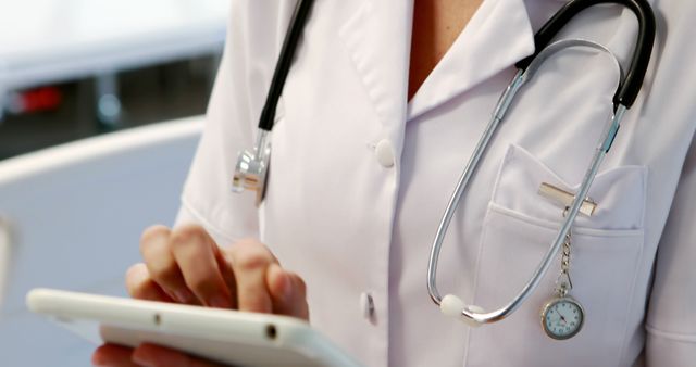 Close-Up of Healthcare Professional Using Digital Tablet - Download Free Stock Images Pikwizard.com