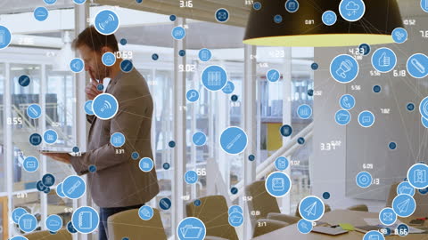 Businessman Utilizing Network of Communication Icons in Modern Office