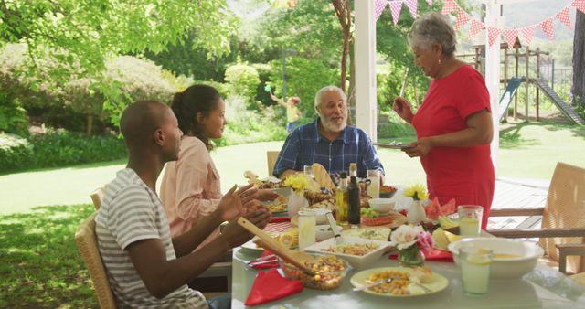 Multi-generational Family Enjoying Outdoor Picnic - Download Free Stock Images Pikwizard.com