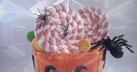 Halloween Candy Bucket with Spiders and Lollipops